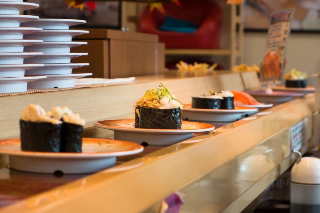 Plates of sushi at a conveyor belt sushi restaurant