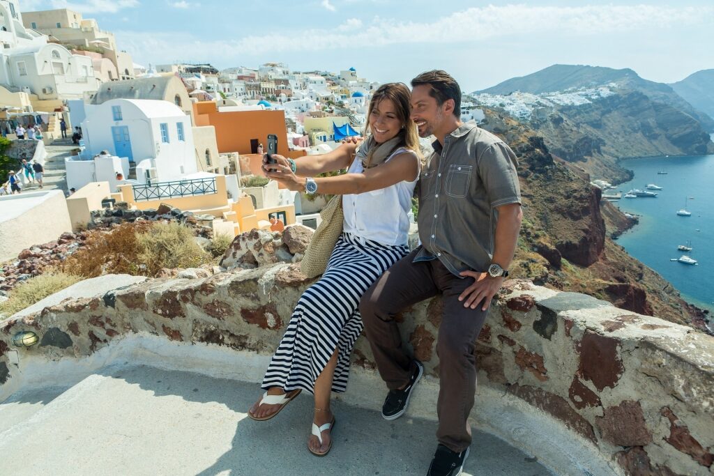 Couple sightseeing in Oia