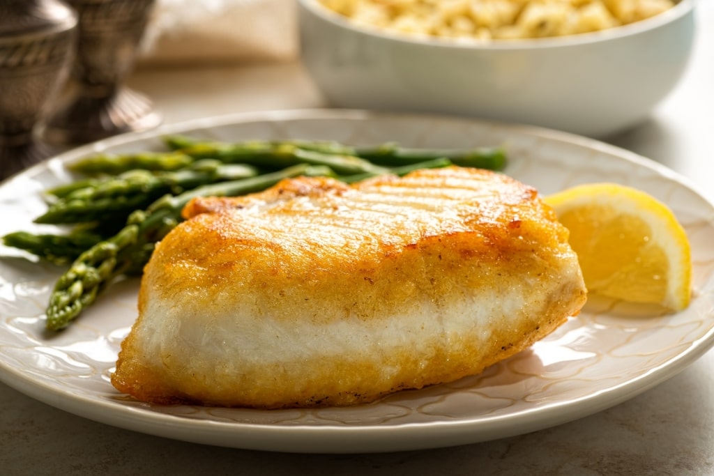 Cooked halibut on a plate