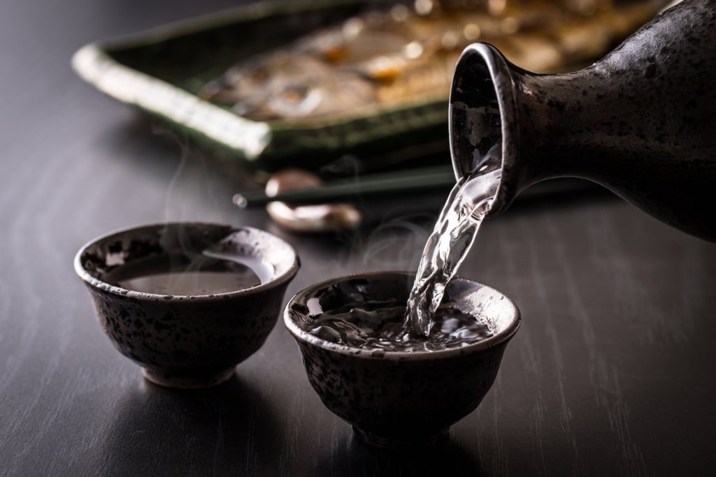 Man pouring a glass of sake