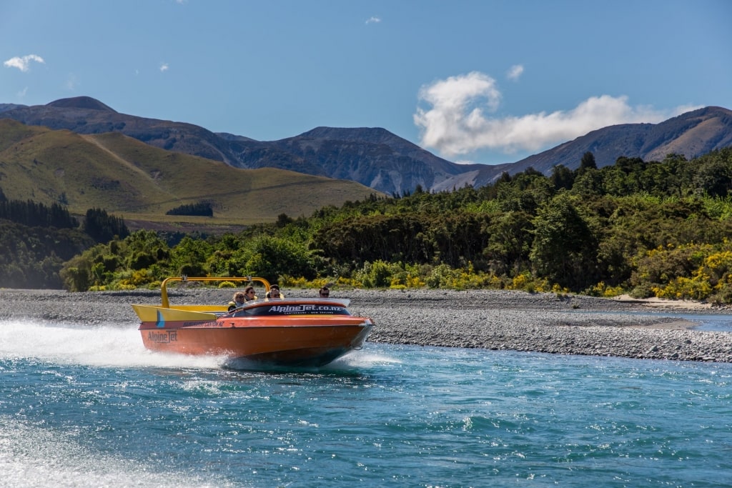 People on an alpine jet boat