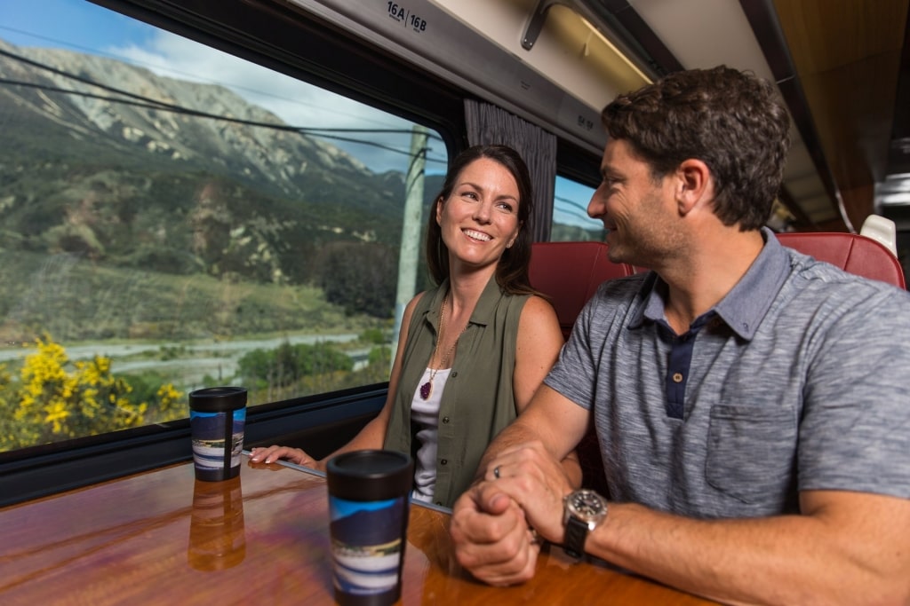 Couple aboard TranzAlpine Express