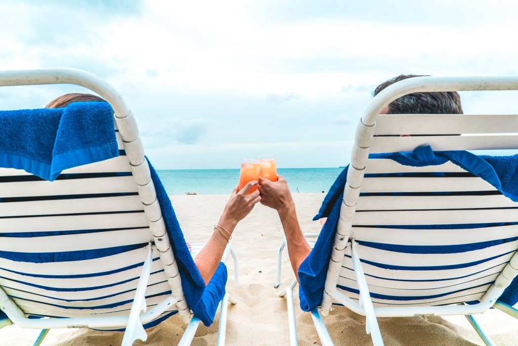 Couple relaxing in Fort James Beach