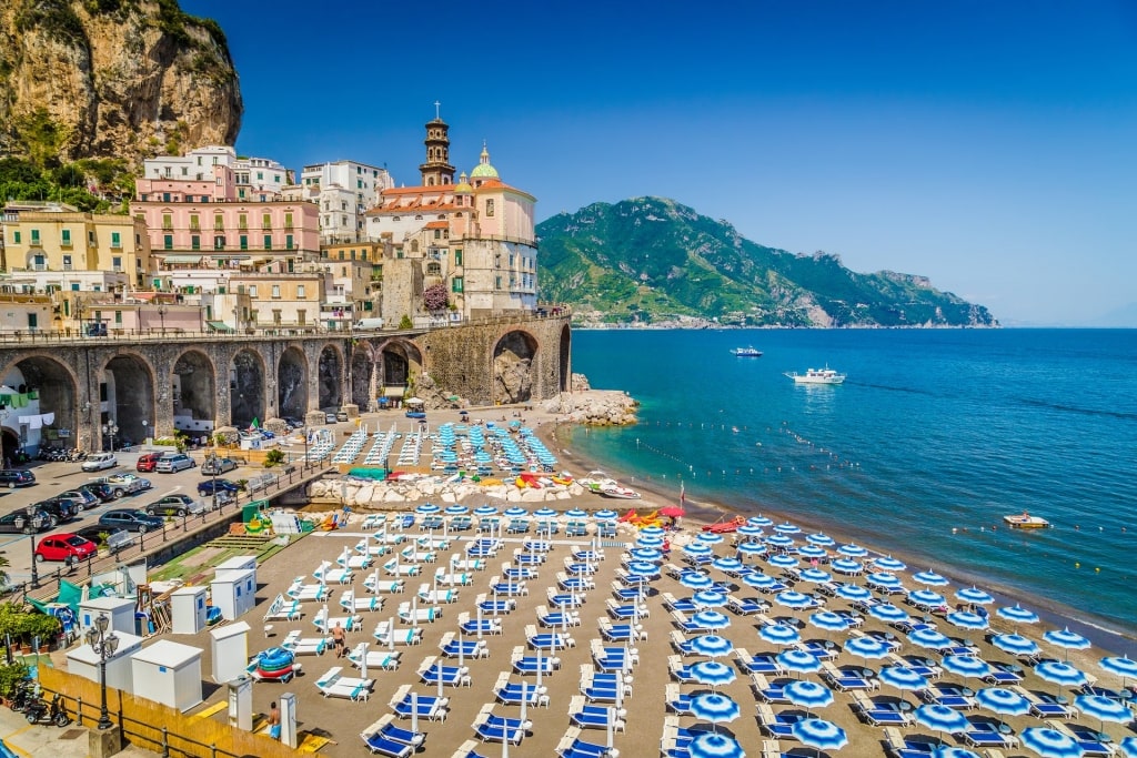 Blue umbrellas lined up on Atrani, Salerno