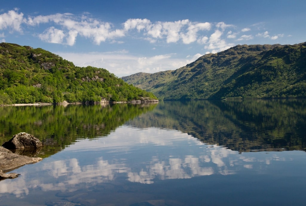 Lush mountains towering over Loch Lomond