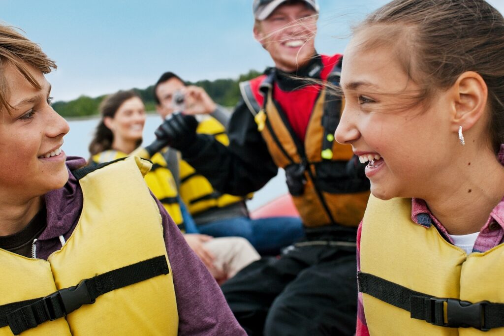 Family on a rafting adventure in Alaska