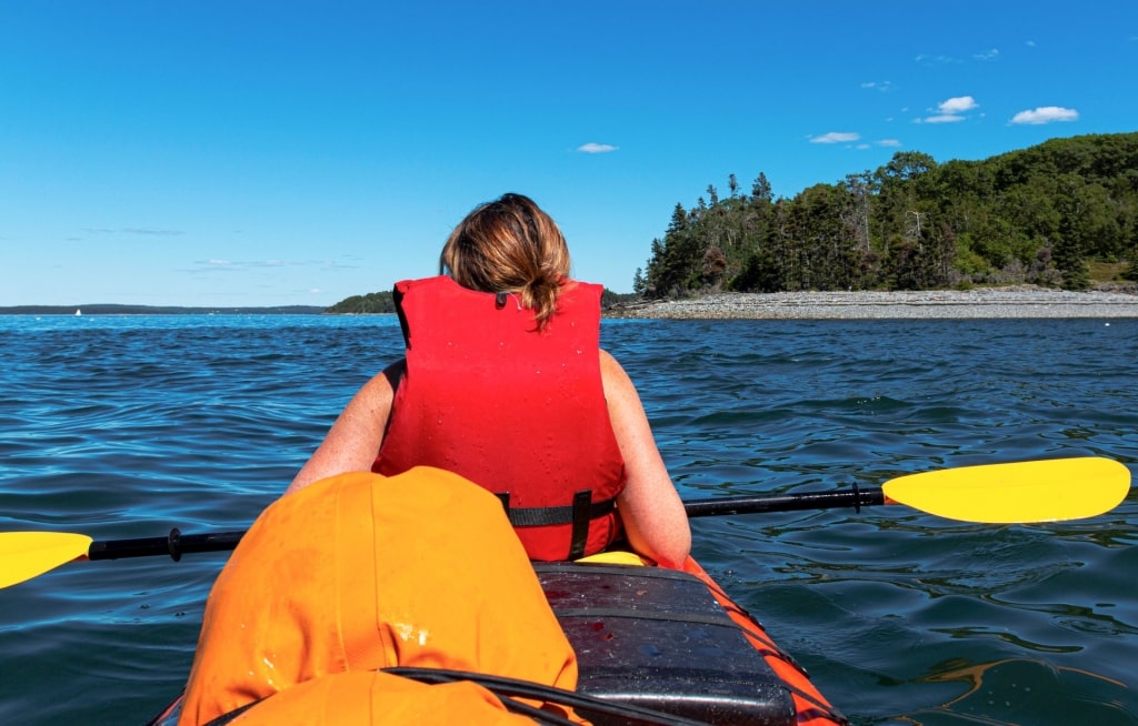 Woman kayaking in Frenchman Bay