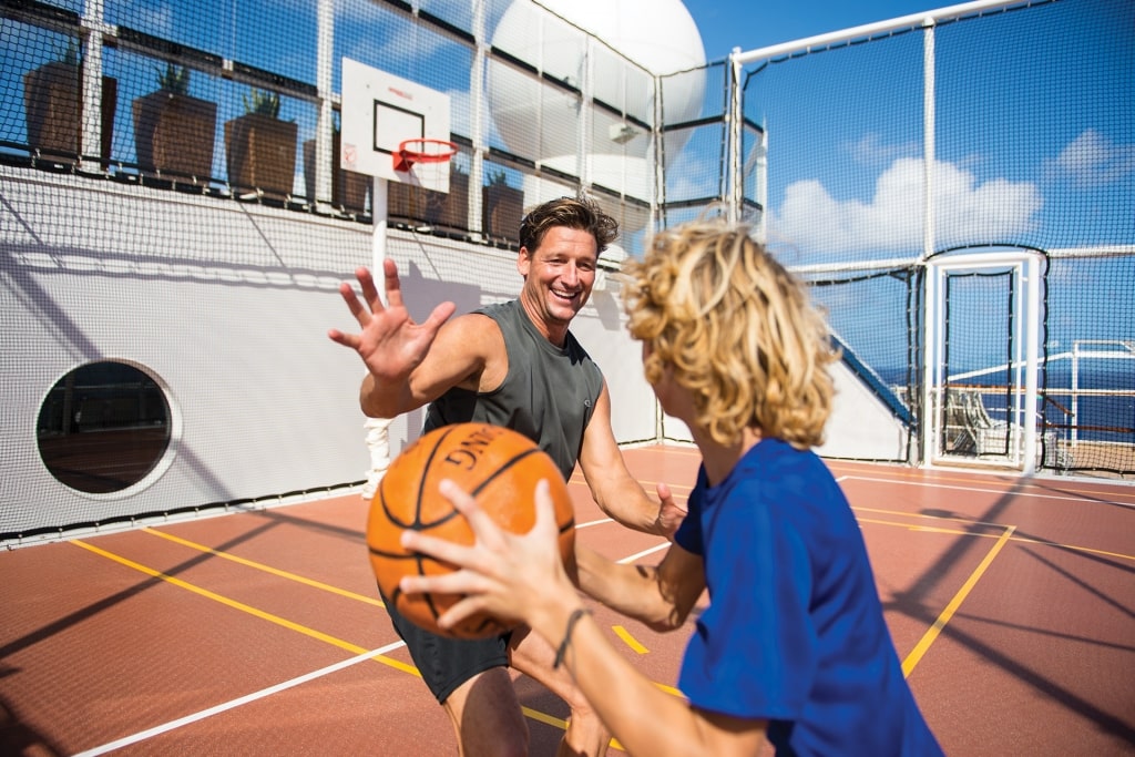 People playing basketball on a cruise