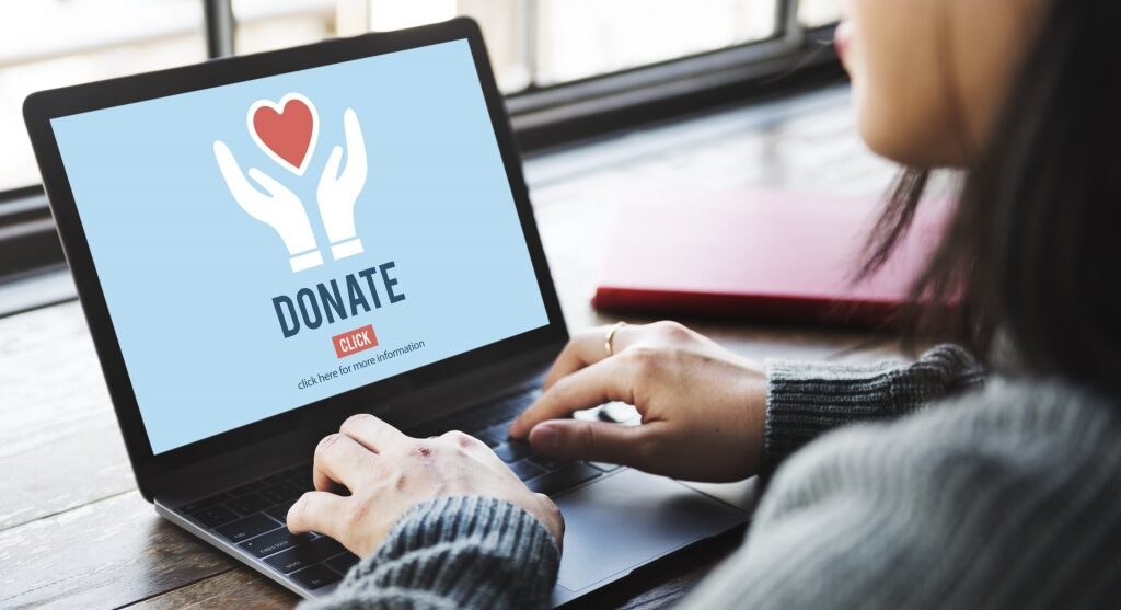 Woman donating to a charity online