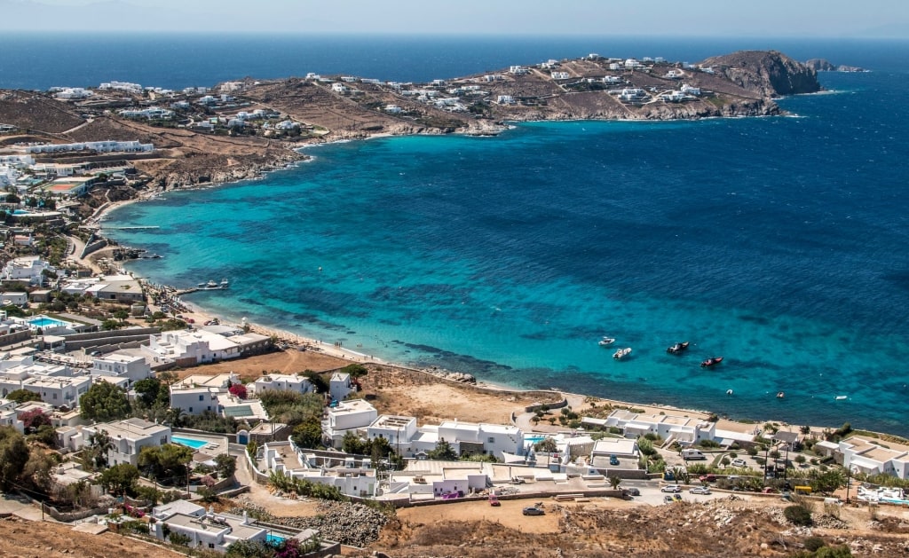 Aerial view of Agios Ioannis Beach with dark blue water