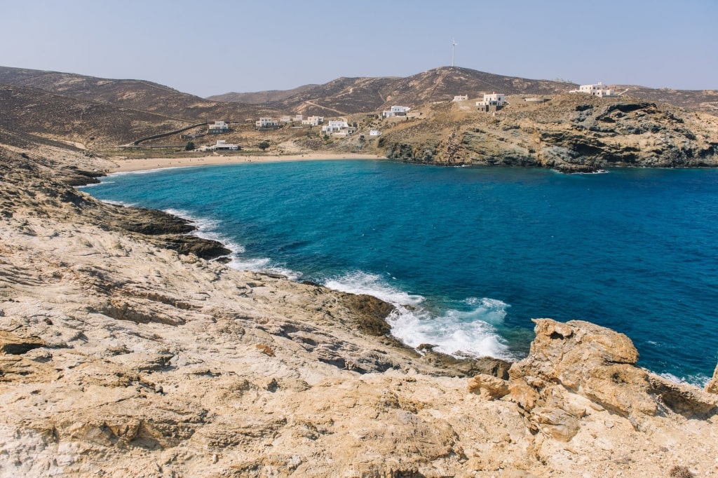 Dark blue waters of Fokos Beach with rocky shoreline