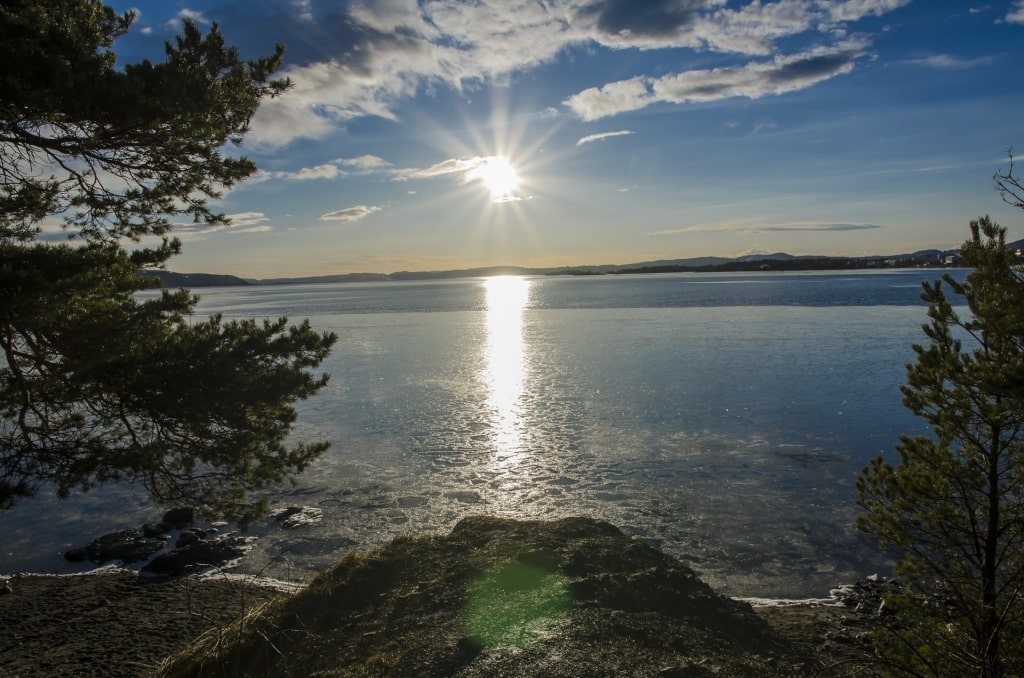 Sun gleaming in Paradisbukta Beach