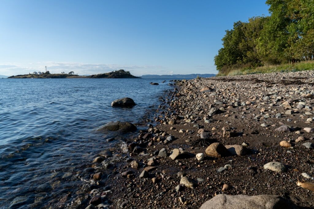 Rocky shore of Tronvik Beach in Jeloya Island