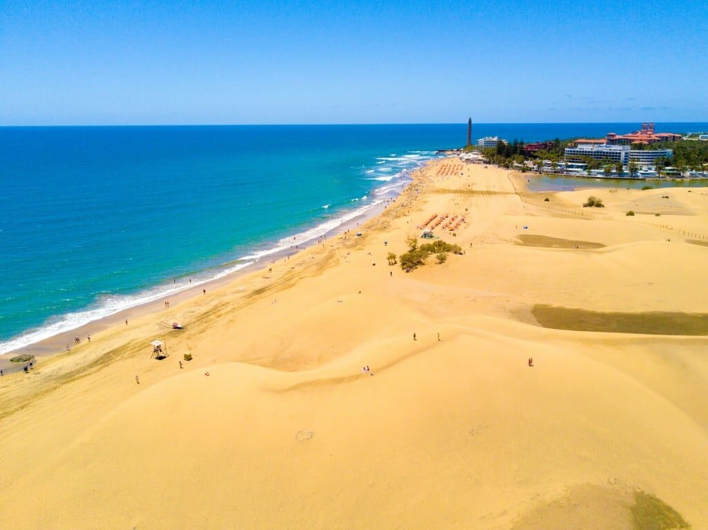 Scenic view of Maspalomas Beach with sand dunes
