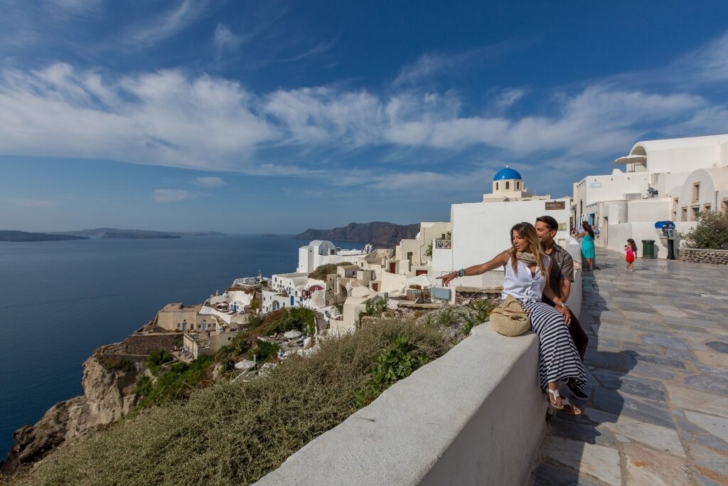 Couple sightseeing in Oia