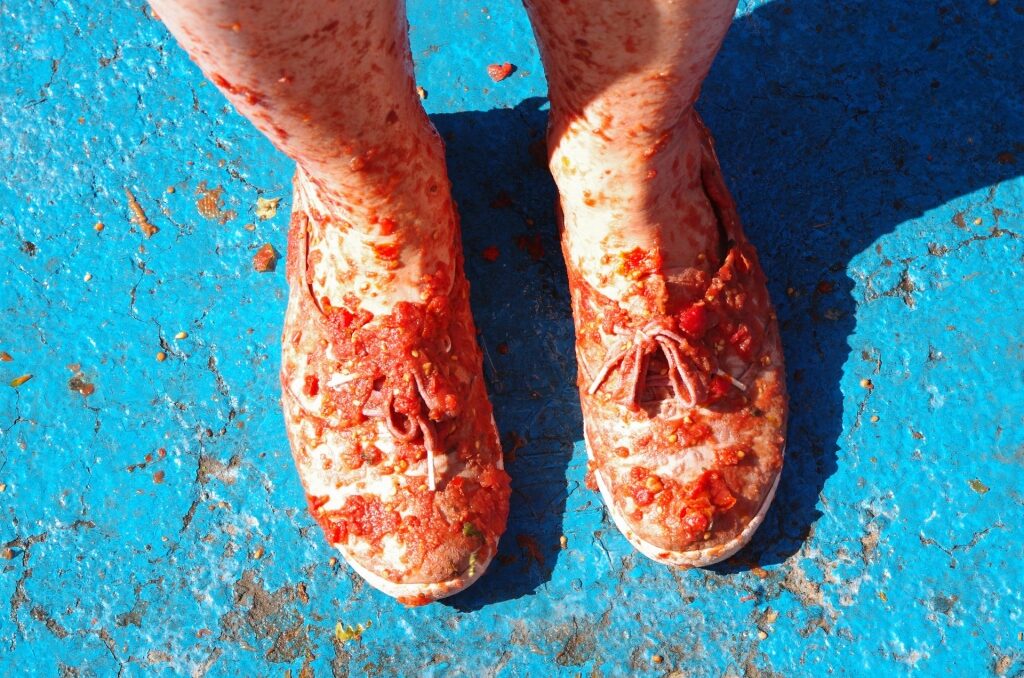 Tomato-covered shoes during La Tomatina
