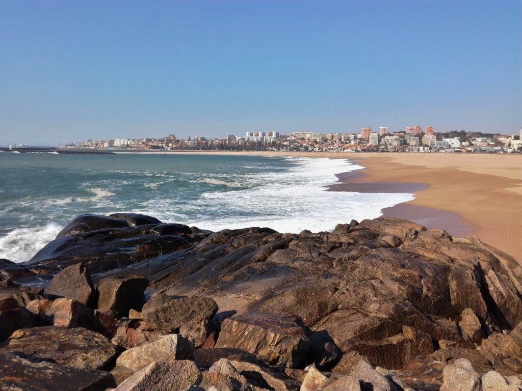 View of Praia Cabedelo do Douro with brown sands