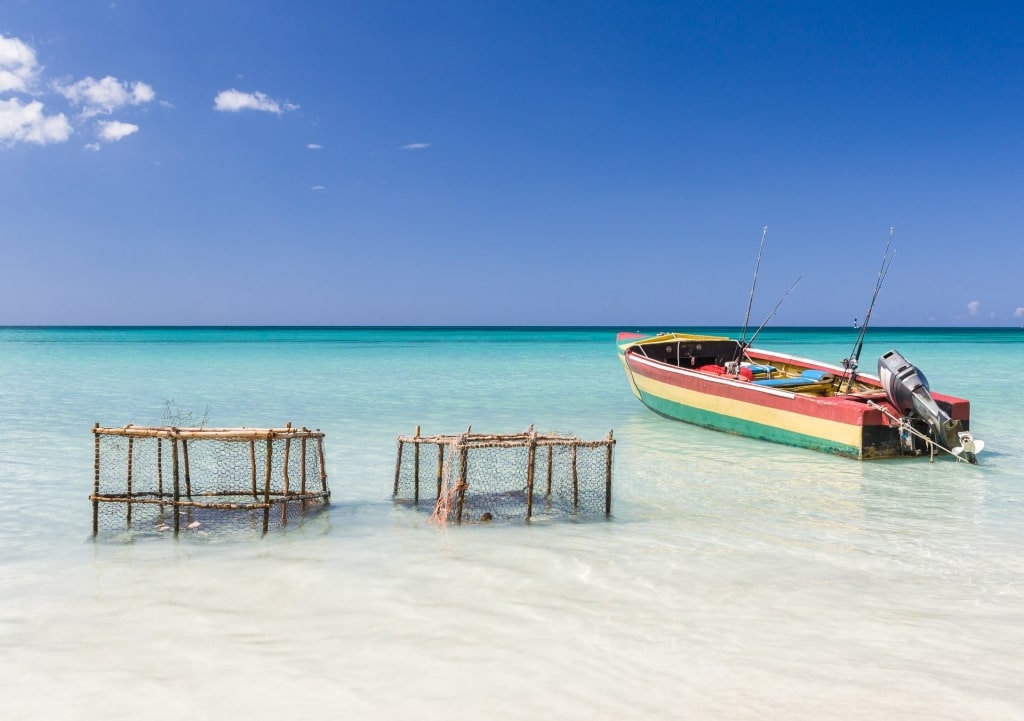 Calm waters of Bloody Bay Beach with boat