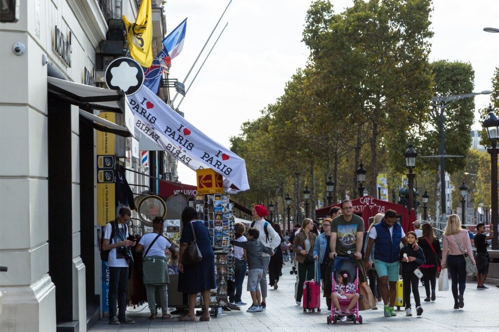 People shopping along Champs-Élysées in Paris, France