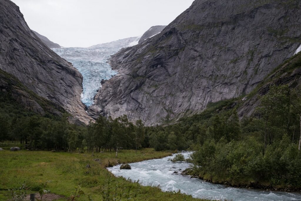 View of Briksdal Glacier with river