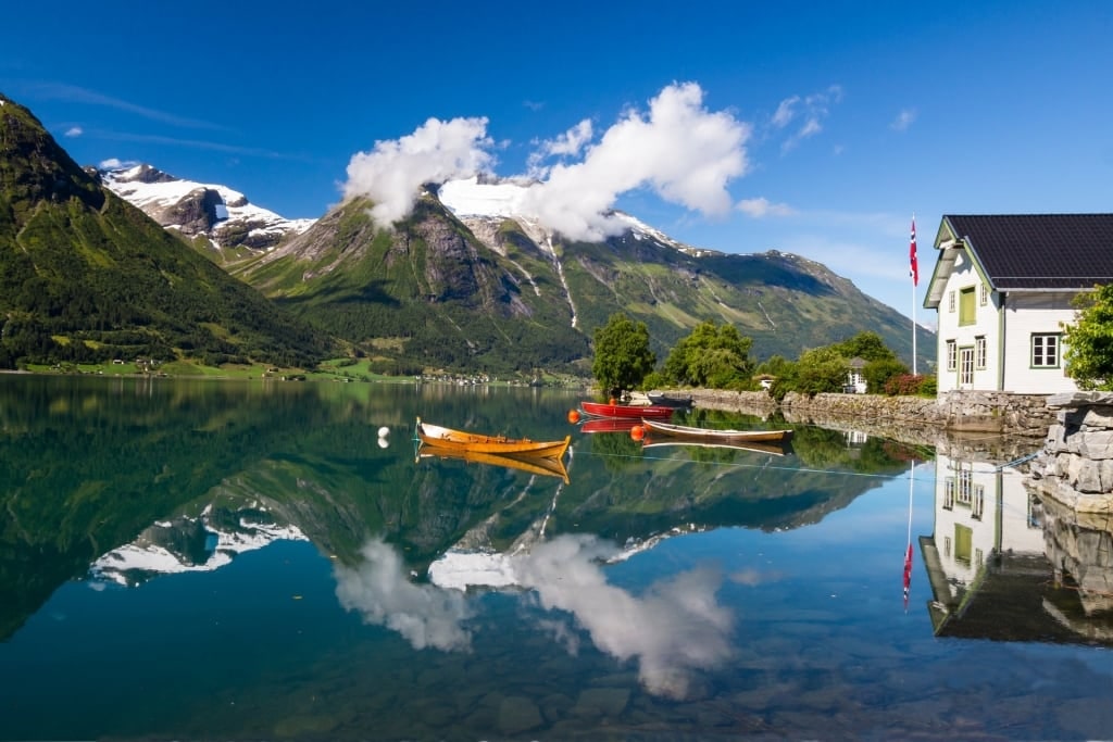 Beautiful view of Lake Oppstryn with mountains as backdrop