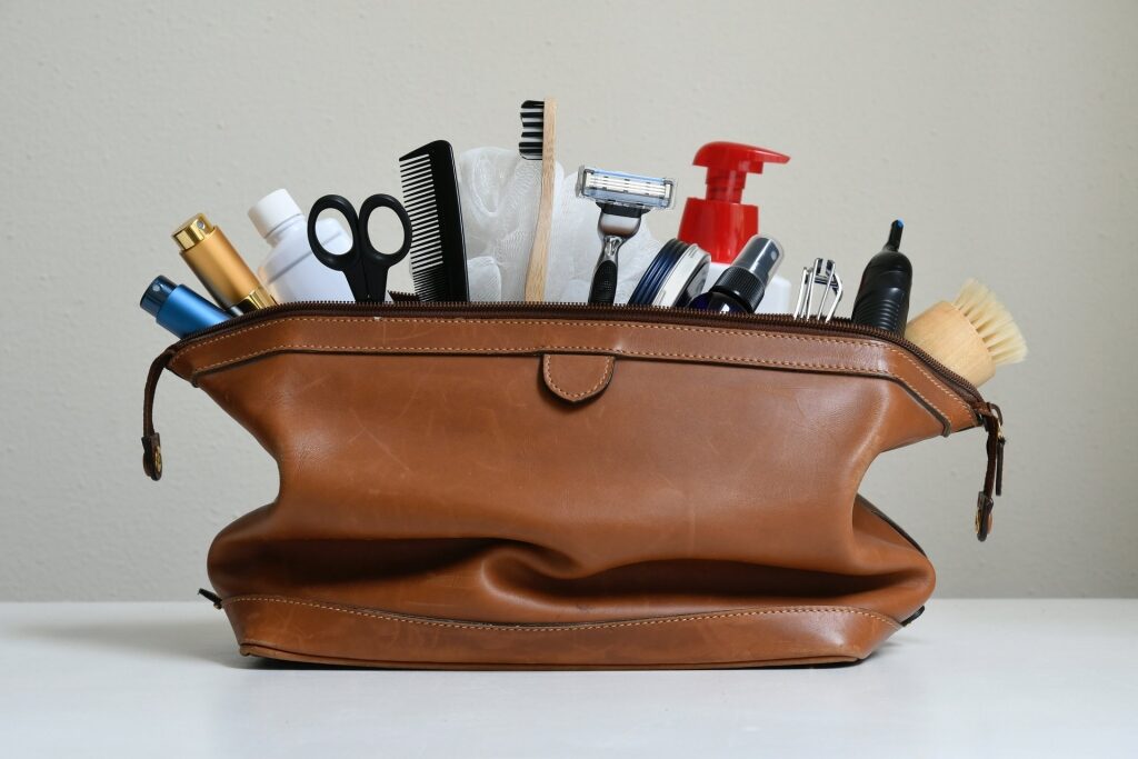 Leather toiletry bag with travel-size products