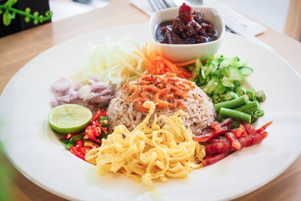 Plate of savory khao kluk kapit