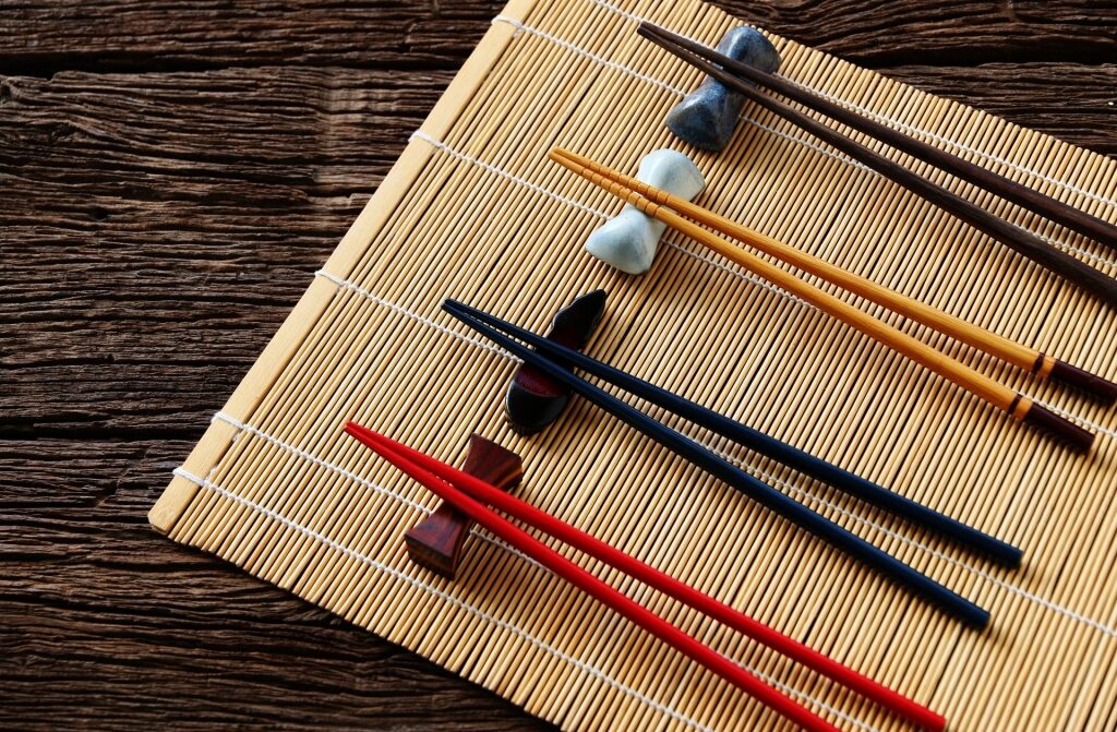 Chopsticks lined up on a table