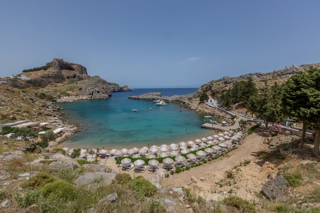 Umbrellas lined up at the Agios Pavlos Beach