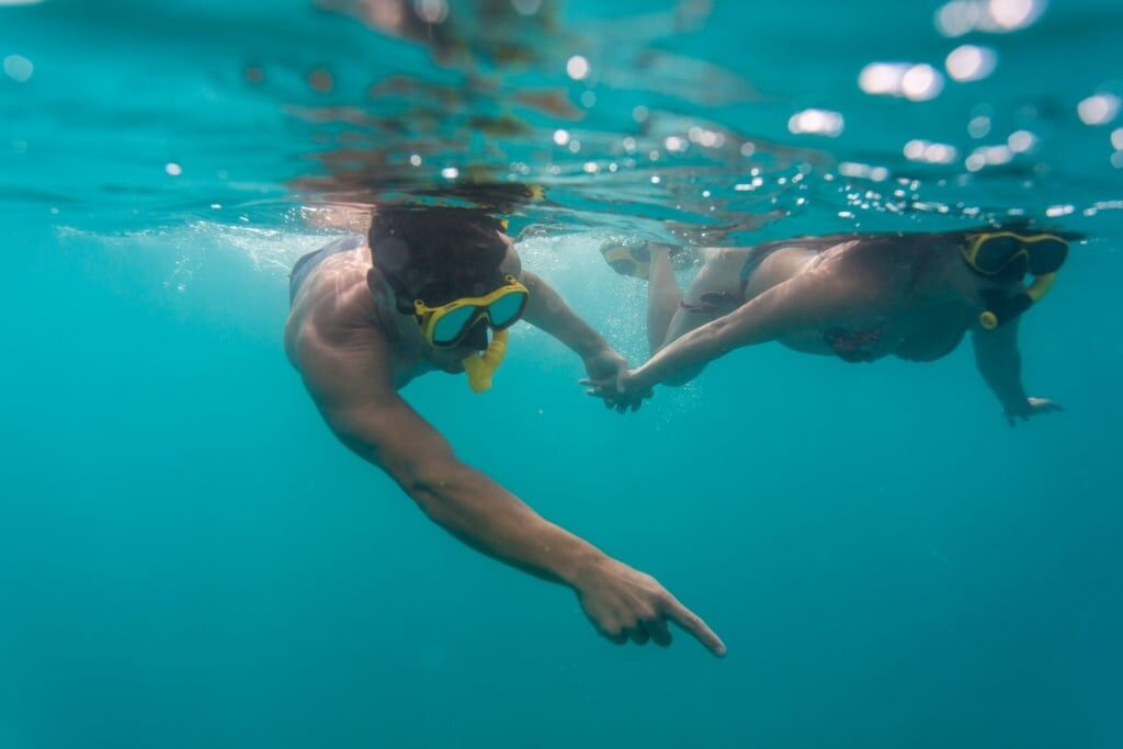 Couple snorkeling in St. Maarten