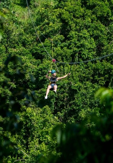 Man on one of the best zip lines in the world