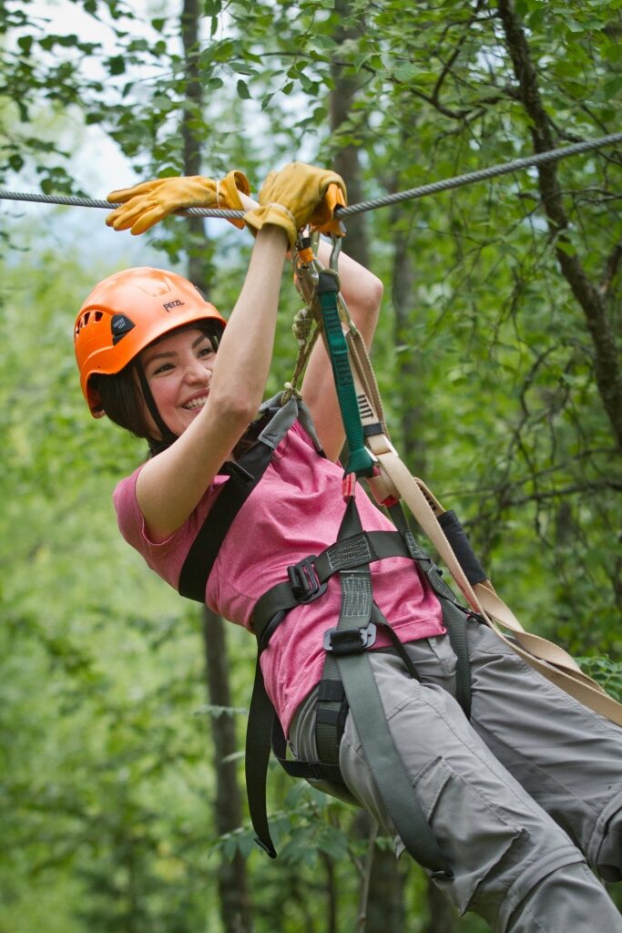 Woman on one of the best zip lines in the world