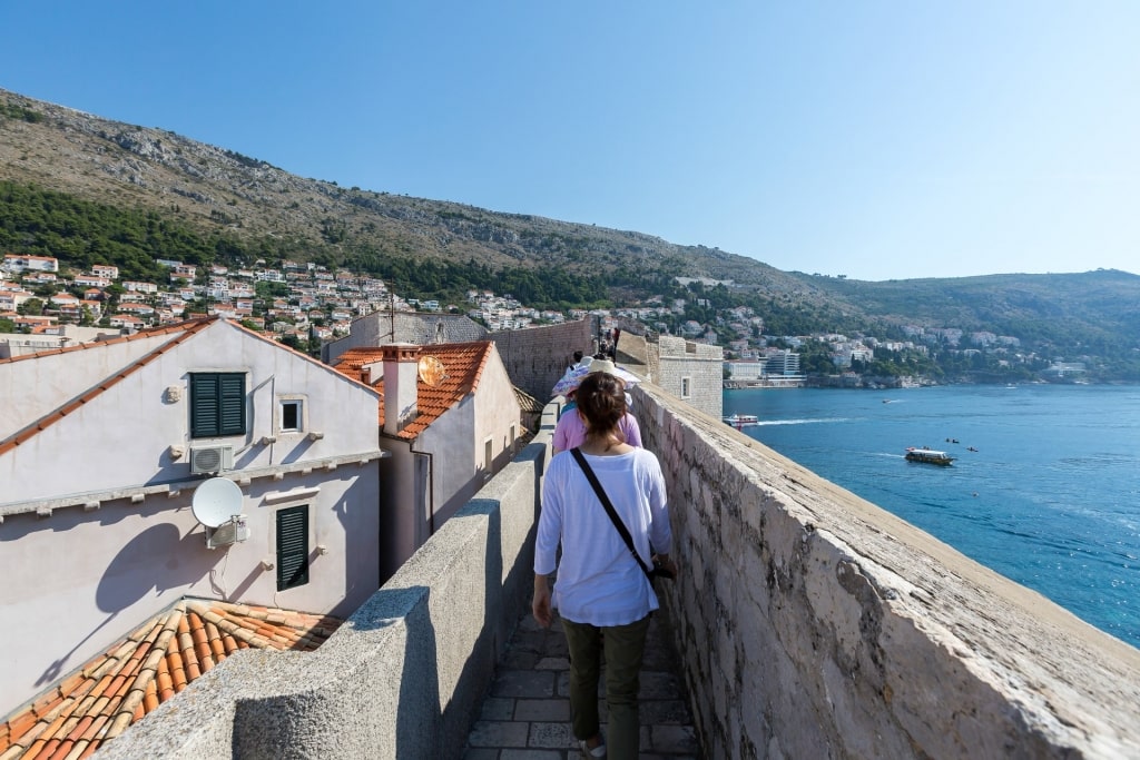 People walking through Old Town Walls