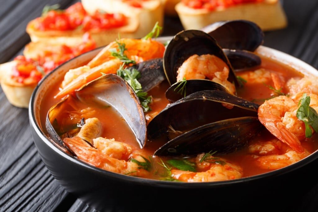 Bowl of savory bouillabaisse, one of the most famous Provencal food