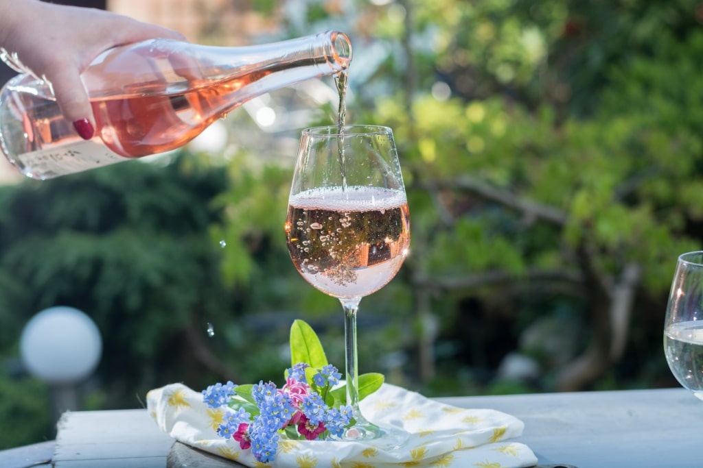 Man pouring Rosé wine