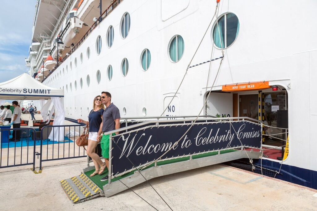 Couple disembarking Celebrity Cruises