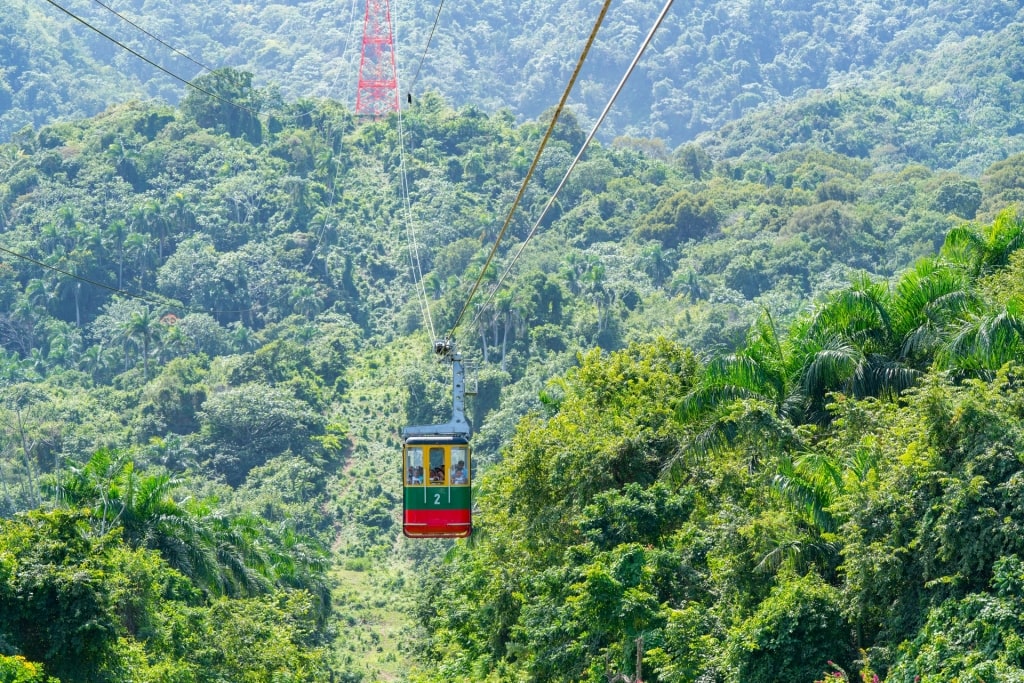 Cable car ride with lush landscape