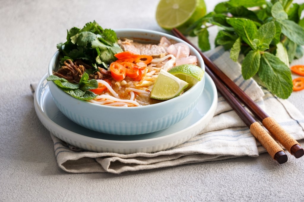 Bowl of Vietnamese noodles with chopsticks