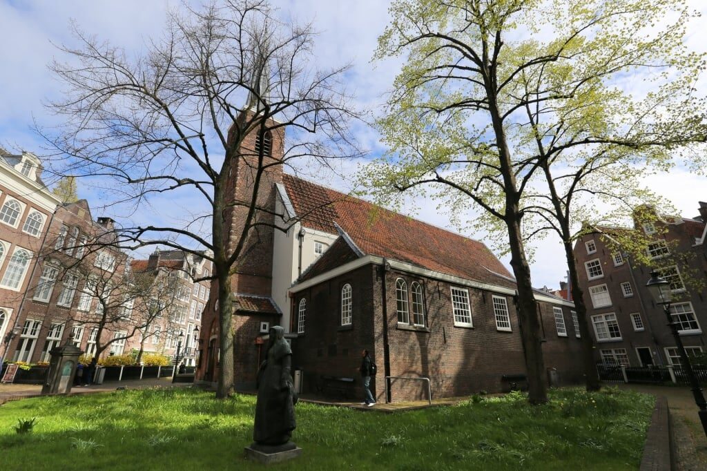 Historical church in Begijnhof Courtyard