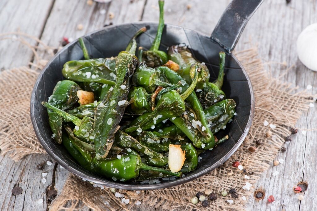 Platter of Padrón Peppers with pepper and olive oil