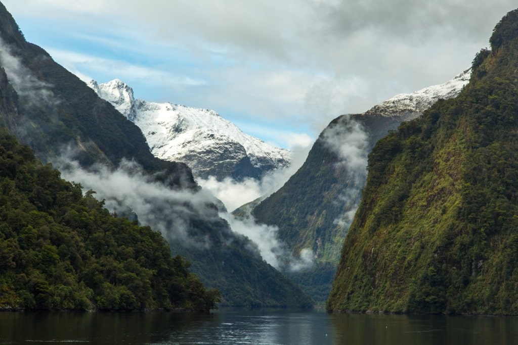 Beautiful landscape of Doubtful Sound reflecting on waters