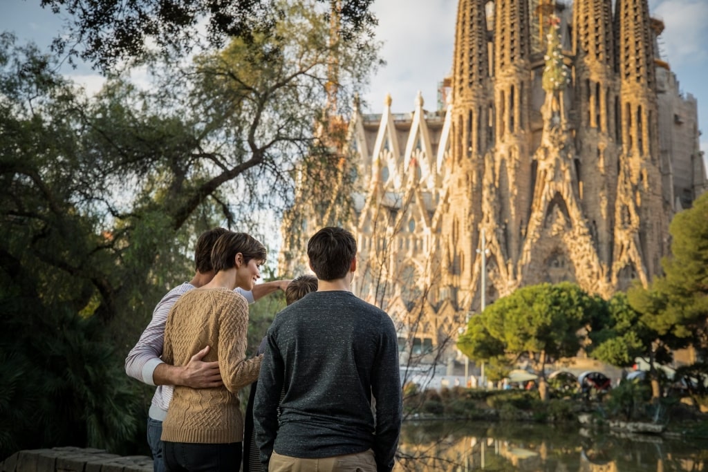 Family looking at the majestic La Sagrada Familia