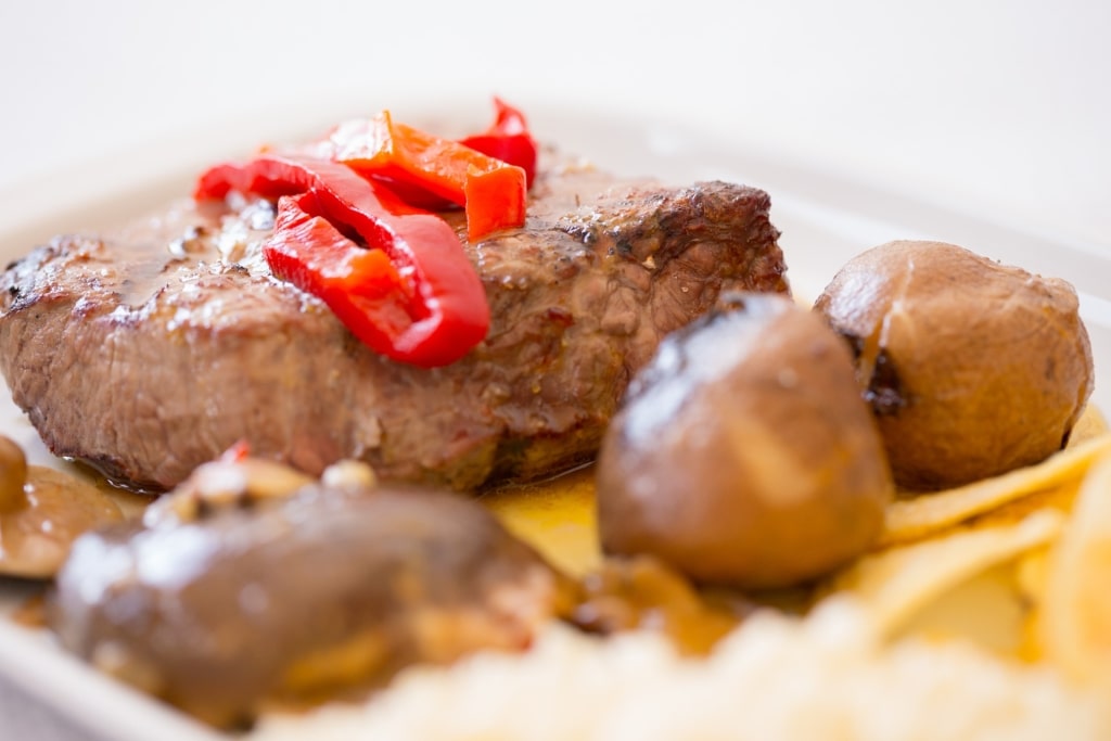 Meaty posta à mirandesa on a plate