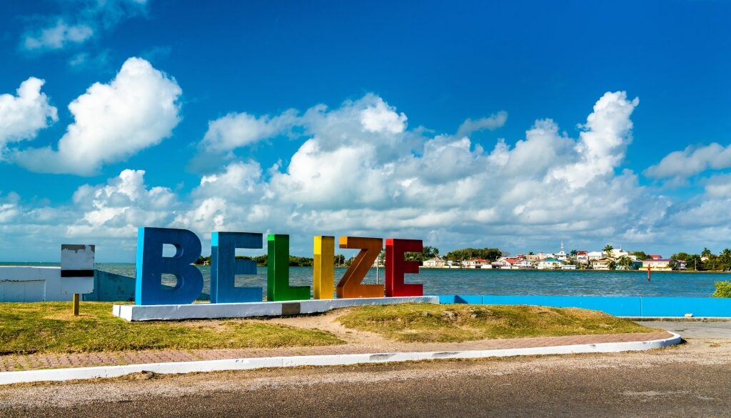 Iconic Belize Sign Monument with view of the water