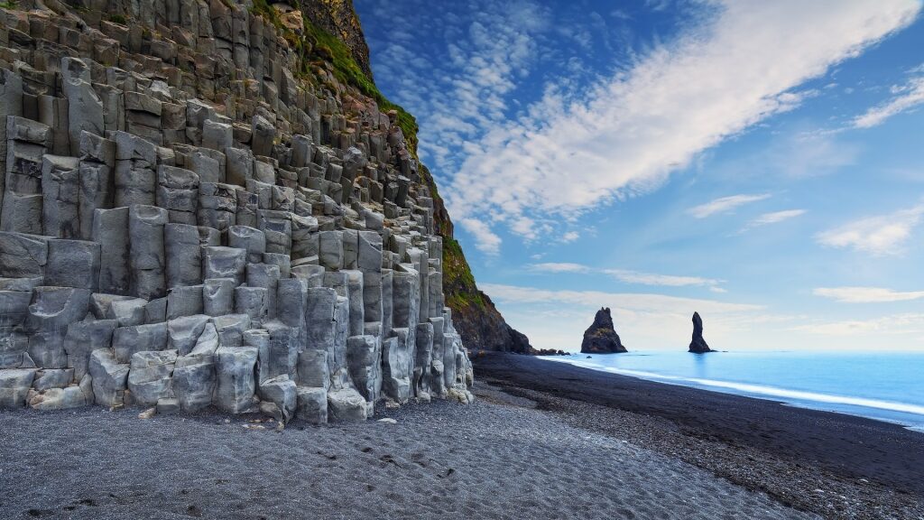 Amazing rock formation towering over Reynisfjara Beach, Iceland