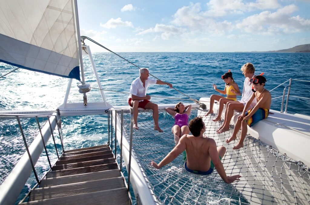 Family on a catamaran cruise in the Caribbean