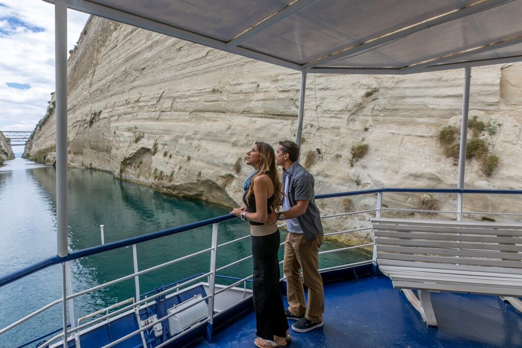 Couple on a boat through Corinth Canal