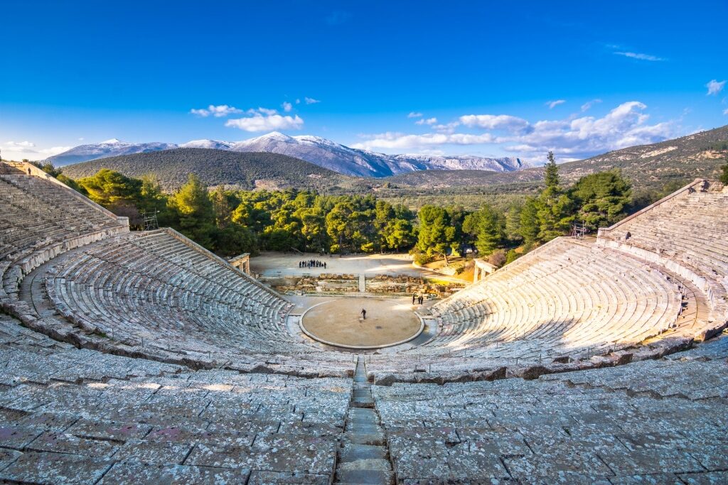 Ancient Epidaurus Theatre with mountain background in Nafplio, Greece
