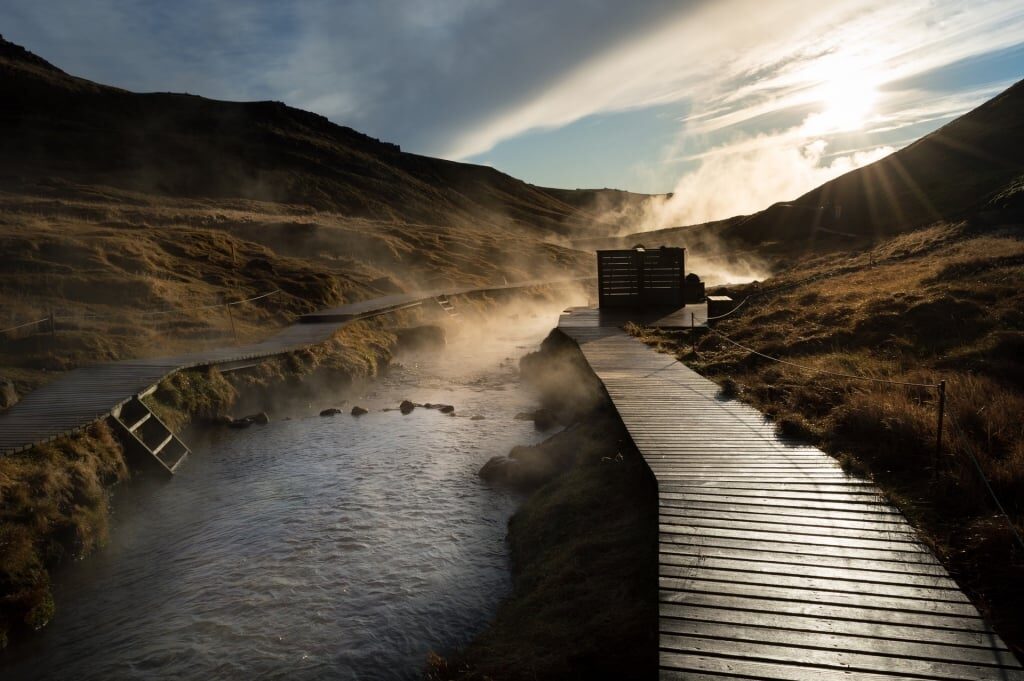 Boardwalk near Reykjadalur Steam Valley with steaming water
