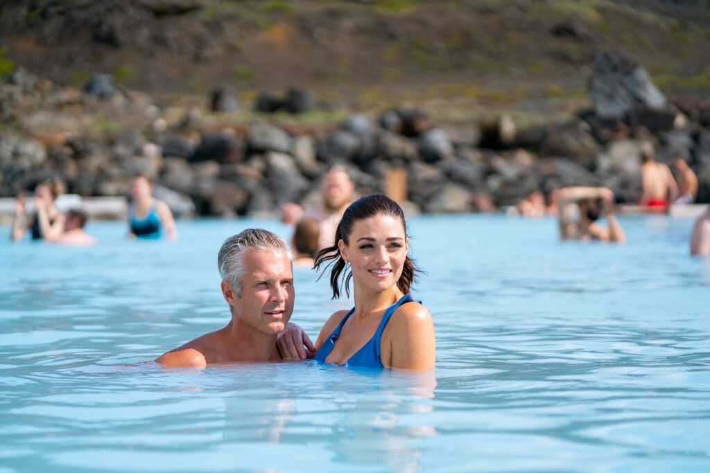 Couple swimming in Myvatn Nature Baths